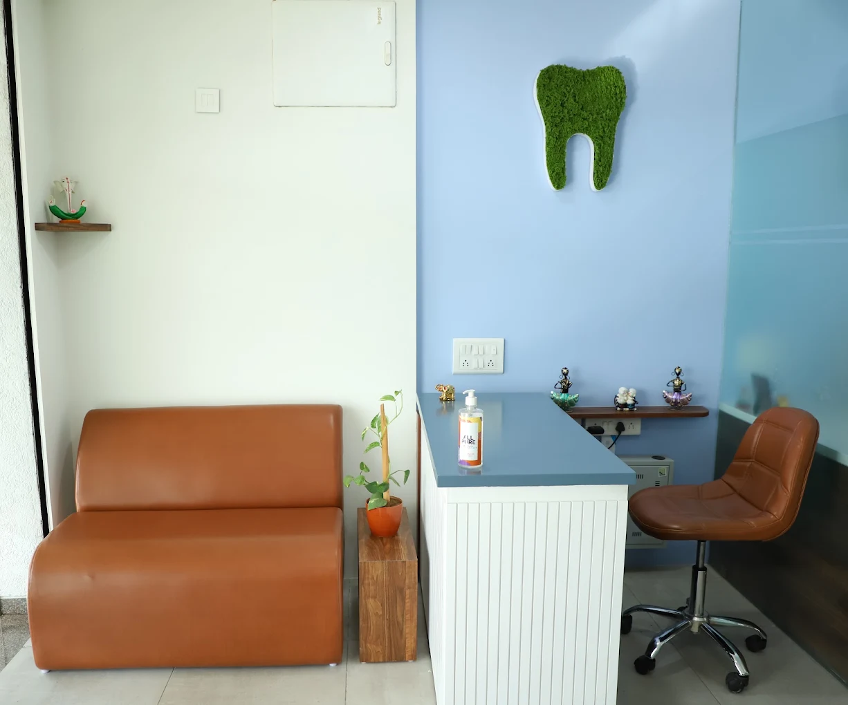 Reception desk and seating at GRIN Dental Care, Naranpura